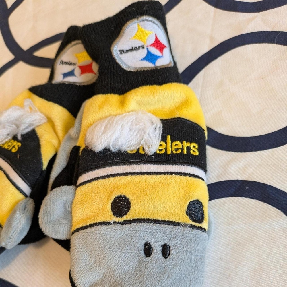 Pittsburgh Steelers dog socks with yellow, black, and gray color blocking